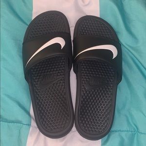Black Nike slides